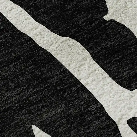 Black And Ivory Abstract Washable Area Rug With UV Protection Photo 2