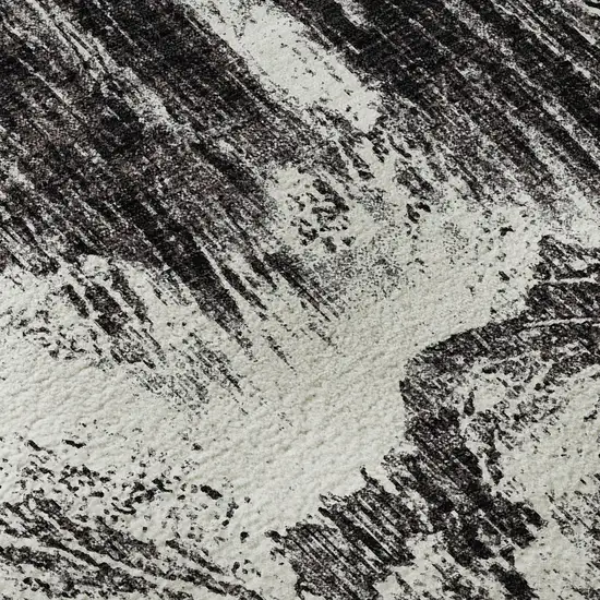 Black And Ivory Abstract Washable Area Rug With UV Protection Photo 9