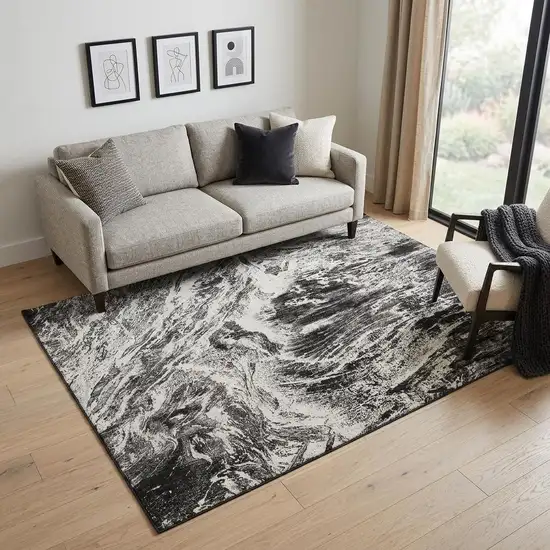 Black And Ivory Abstract Washable Area Rug With UV Protection Photo 1