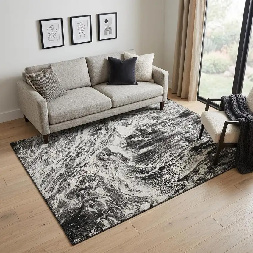 Black And Ivory Abstract Washable Area Rug With UV Protection Photo 1