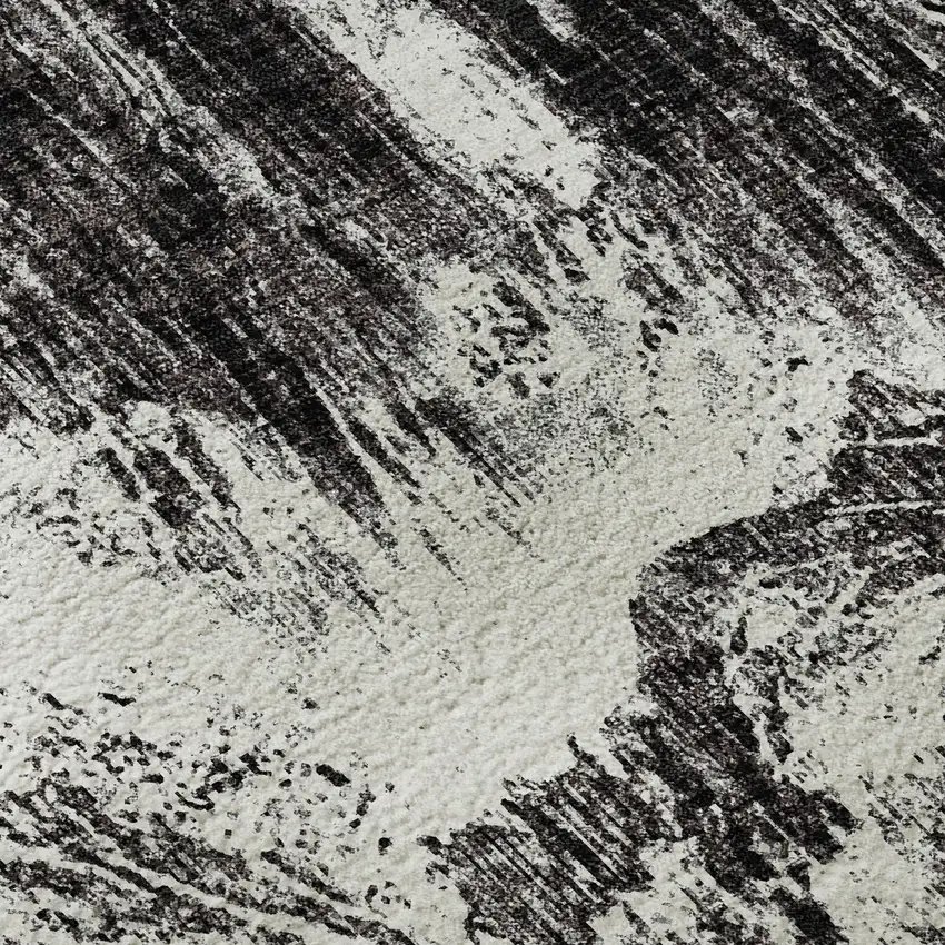 Black And Ivory Abstract Washable Area Rug With UV Protection Photo 9