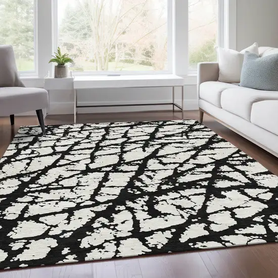 Black And Ivory Abstract Washable Area Rug With UV Protection Photo 5
