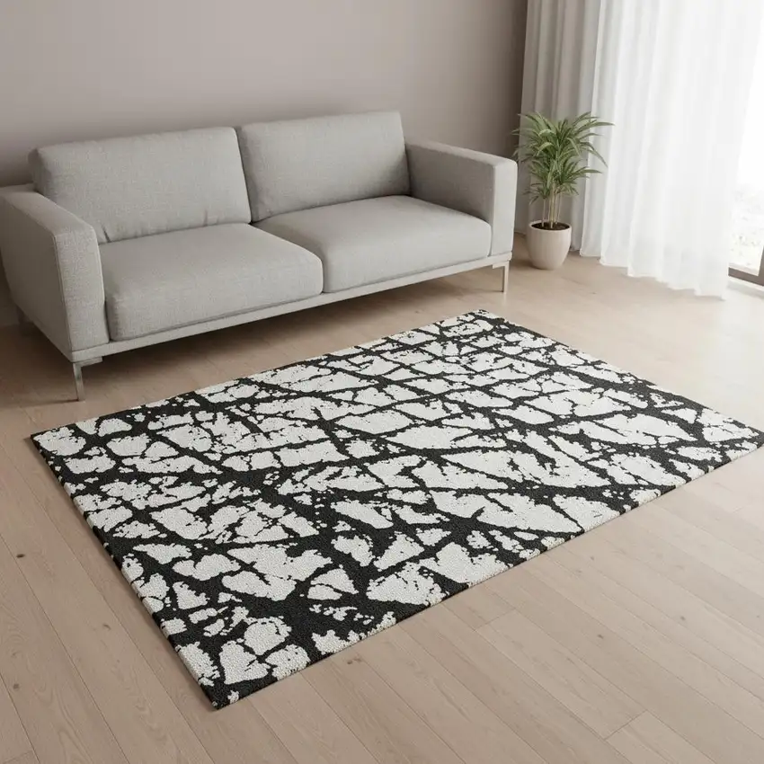 Black And Ivory Abstract Washable Area Rug With UV Protection Photo 2