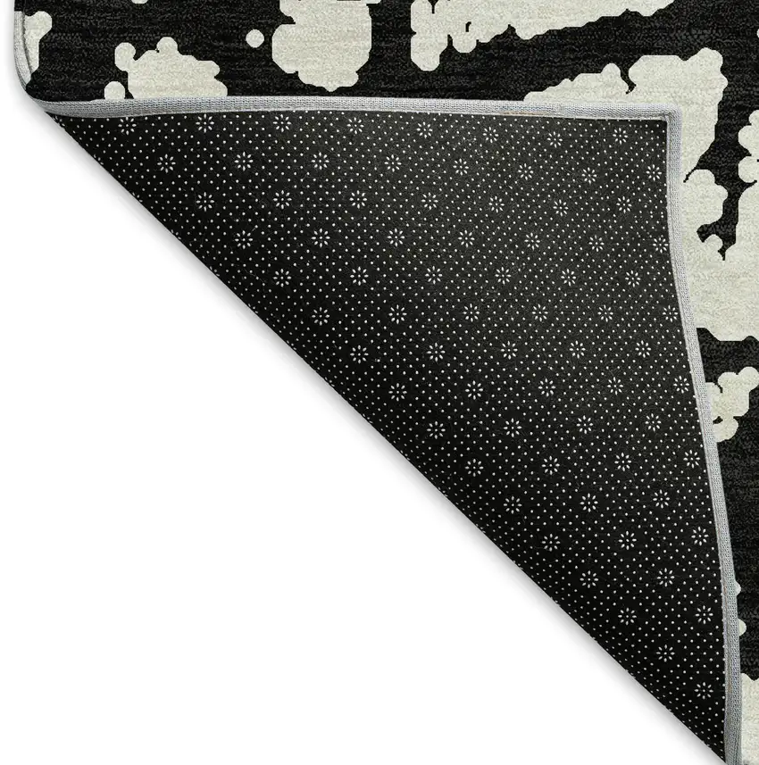 Black And Ivory Abstract Washable Area Rug With UV Protection Photo 6