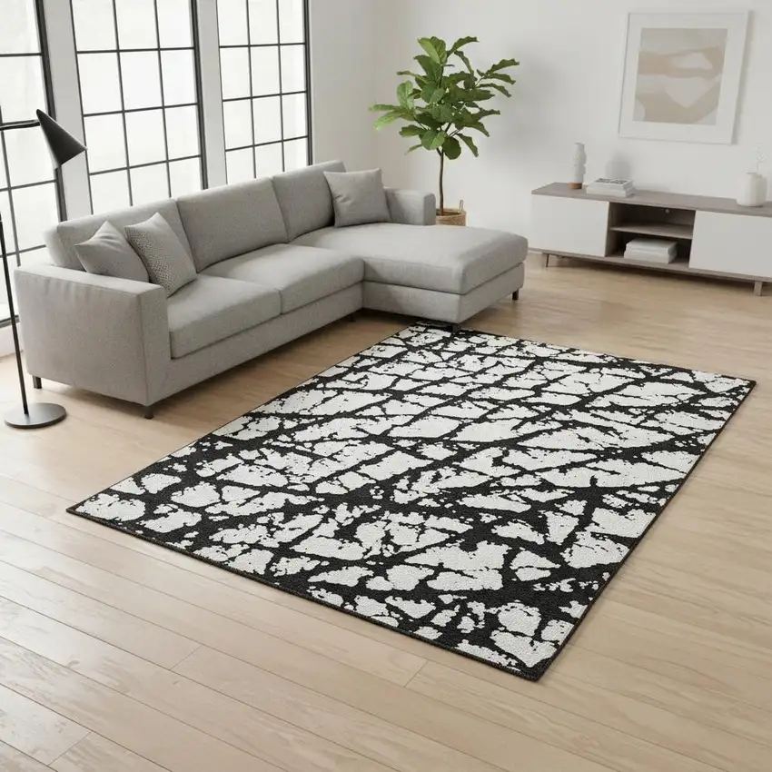 Black And Ivory Abstract Washable Area Rug With UV Protection Photo 2