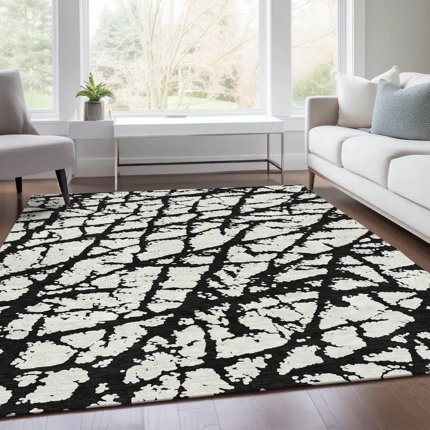 Black And Ivory Abstract Washable Area Rug With UV Protection Photo 5