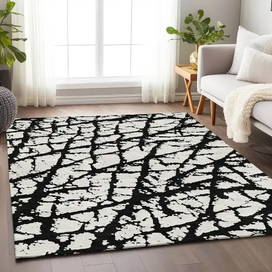 Black And Ivory Abstract Washable Area Rug With UV Protection Photo 4