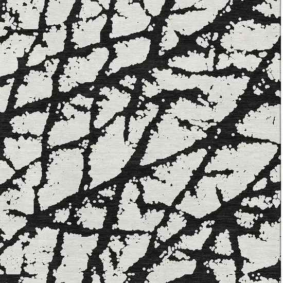 Black And Ivory Abstract Washable Area Rug With UV Protection Photo 2