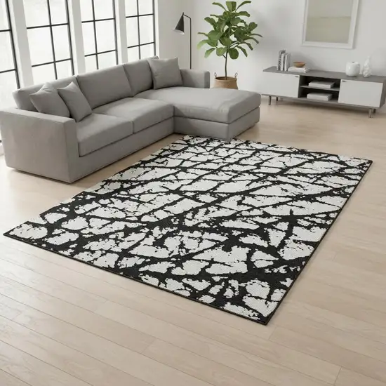 Black And Ivory Abstract Washable Area Rug With UV Protection Photo 2