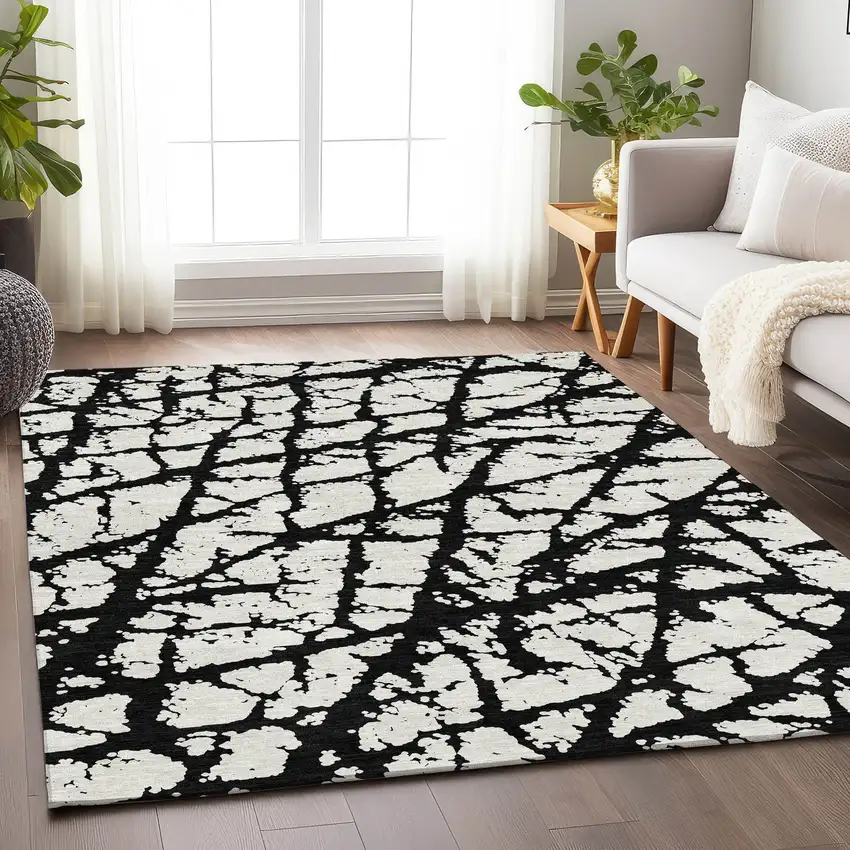 Black And Ivory Abstract Washable Area Rug With UV Protection Photo 4