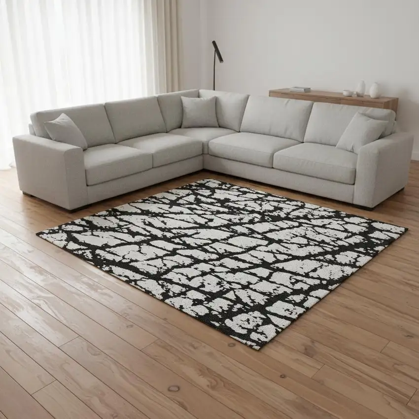Black And Ivory Abstract Washable Area Rug With UV Protection Photo 2