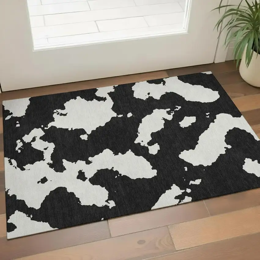 Black And Ivory Abstract Washable Area Rug With UV Protection Photo 2
