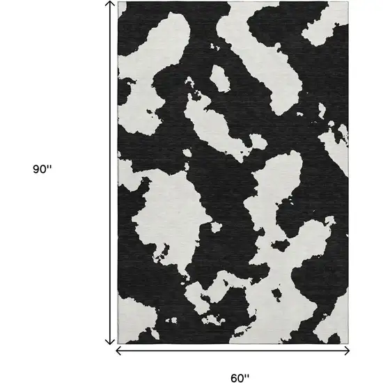 Black And Ivory Abstract Washable Area Rug With UV Protection Photo 8
