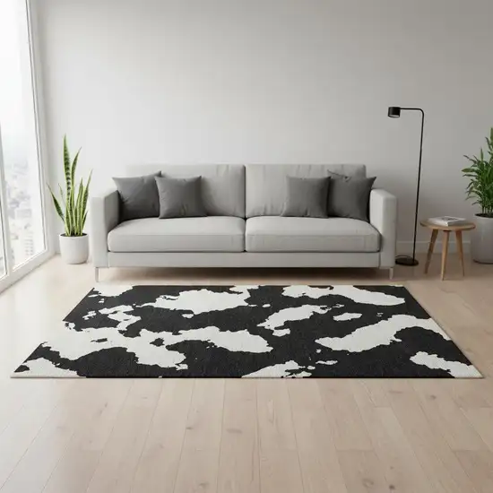 Black And Ivory Abstract Washable Area Rug With UV Protection Photo 2