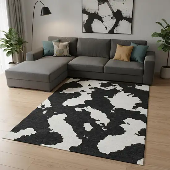 Black And Ivory Abstract Washable Area Rug With UV Protection Photo 2
