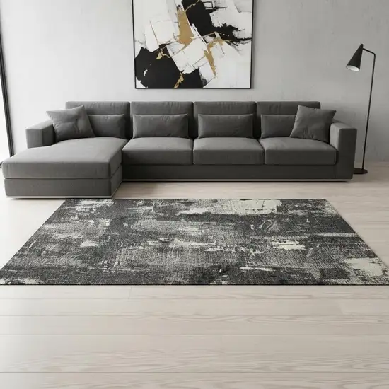 Black And Ivory Abstract Washable Area Rug With UV Protection Photo 2