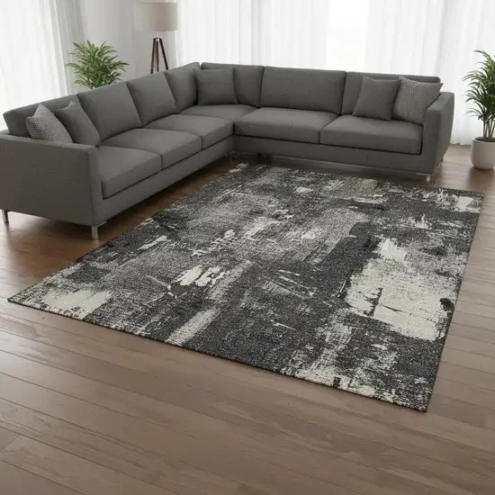 Black And Ivory Abstract Washable Area Rug With UV Protection Photo 2