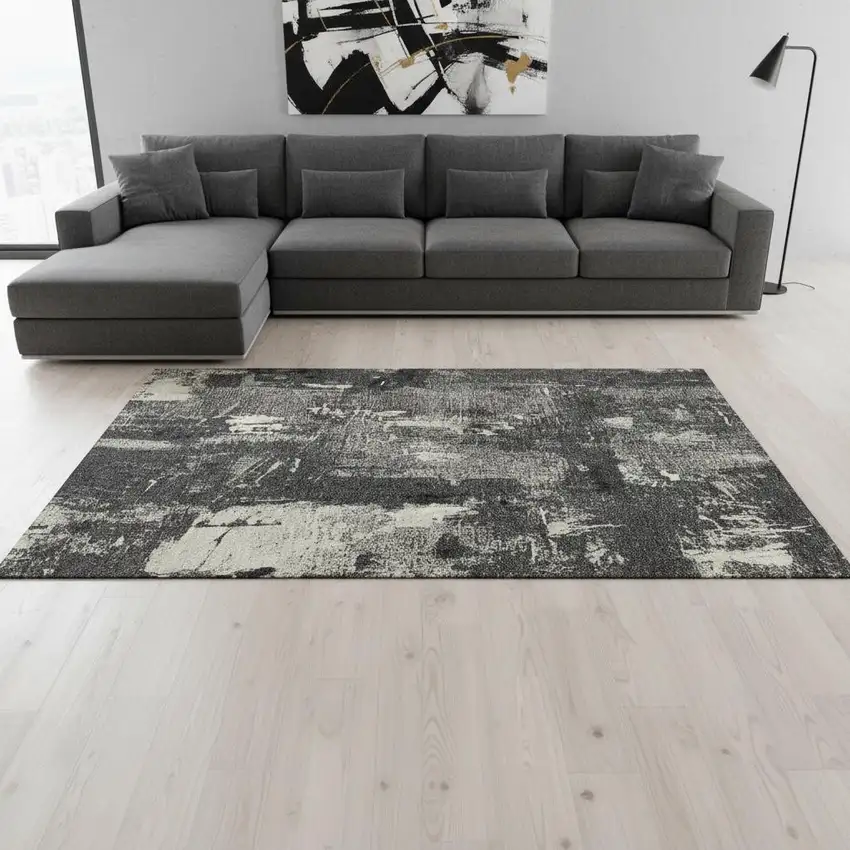 Black And Ivory Abstract Washable Area Rug With UV Protection Photo 2