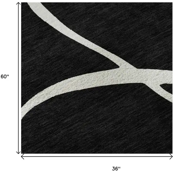 Black And Ivory Abstract Washable Area Rug With UV Protection Photo 9
