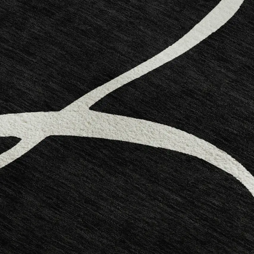Black And Ivory Abstract Washable Area Rug With UV Protection Photo 3