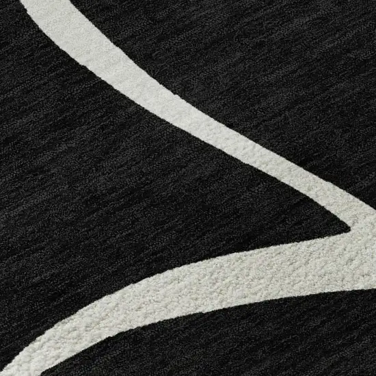 Black And Ivory Abstract Washable Area Rug With UV Protection Photo 3