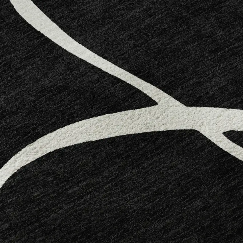 Black And Ivory Abstract Washable Area Rug With UV Protection Photo 1