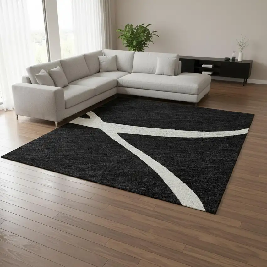 Black And Ivory Abstract Washable Area Rug With UV Protection Photo 2