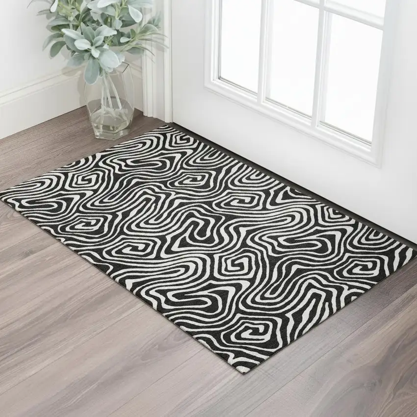 Black And Ivory Abstract Washable Area Rug With UV Protection Photo 2