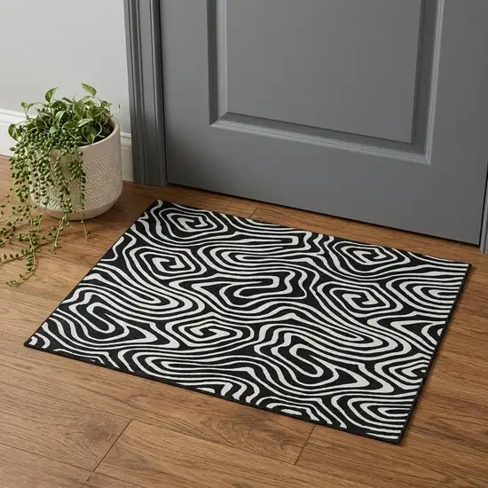 Black And Ivory Abstract Washable Area Rug With UV Protection Photo 1
