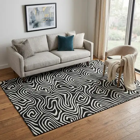Black And Ivory Abstract Washable Area Rug With UV Protection Photo 1