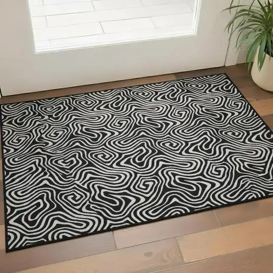 Black And Ivory Abstract Washable Area Rug With UV Protection Photo 2