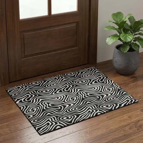 Black And Ivory Abstract Washable Area Rug With UV Protection Photo 1