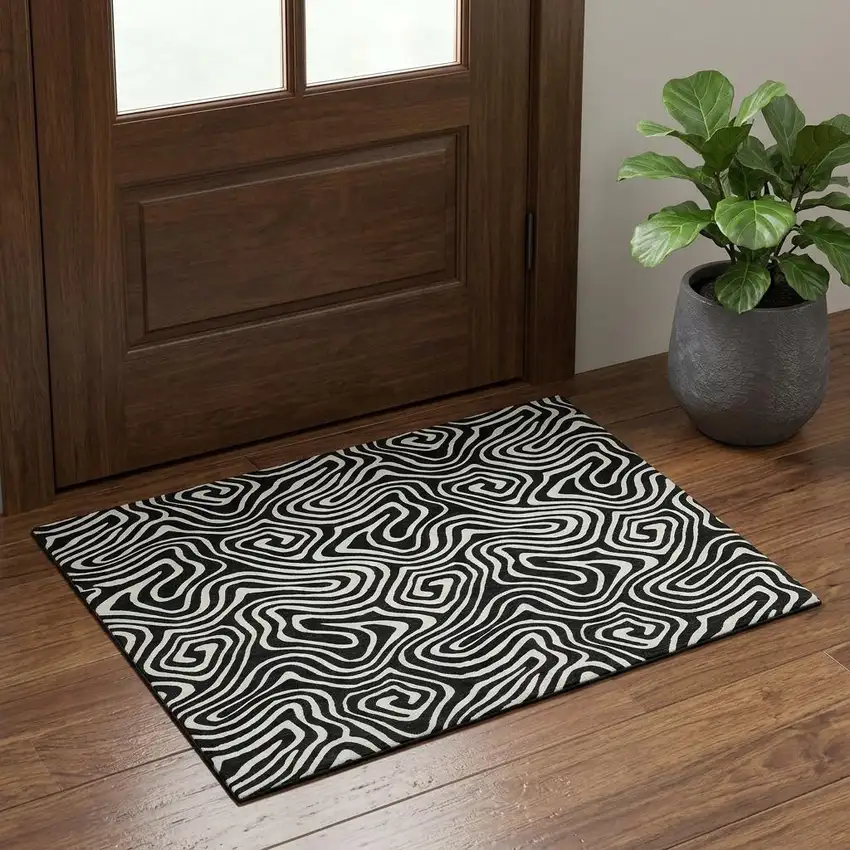 Black And Ivory Abstract Washable Area Rug With UV Protection Photo 1