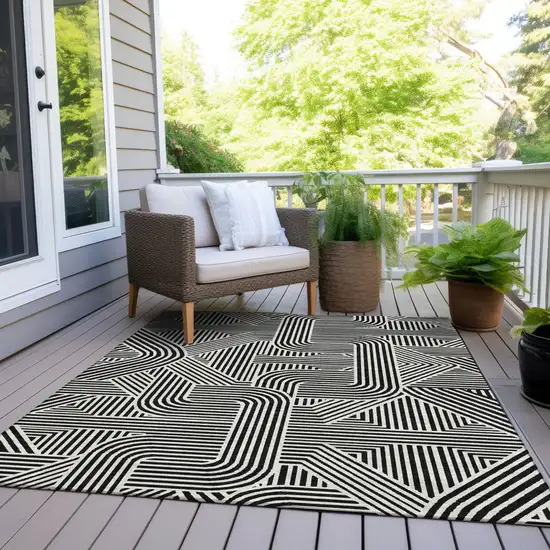 Black And Ivory Abstract Washable Indoor Outdoor Area Rug Photo 8