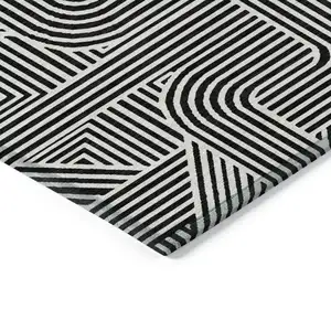 Photo of Black And Ivory Abstract Washable Indoor Outdoor Area Rug