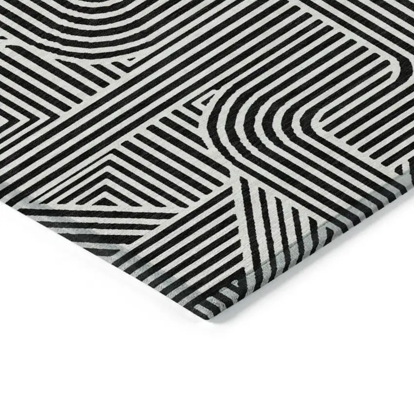 Black And Ivory Abstract Washable Indoor Outdoor Area Rug Photo 5