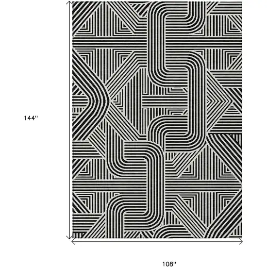 Black And Ivory Abstract Washable Indoor Outdoor Area Rug Photo 3