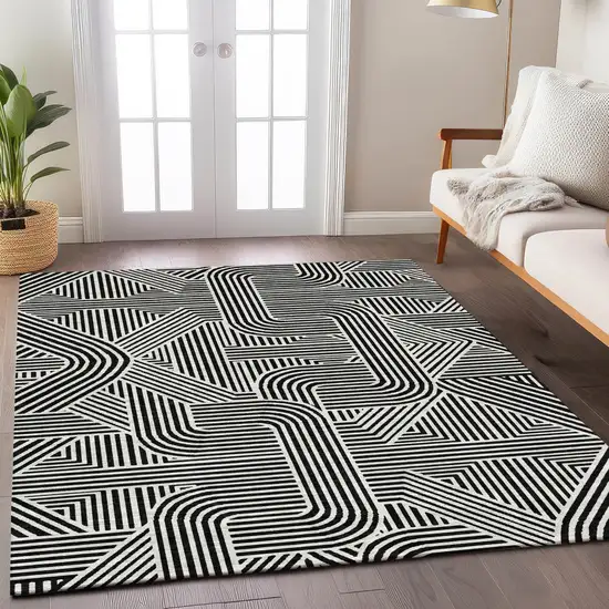 Black And Ivory Abstract Washable Indoor Outdoor Area Rug Photo 9