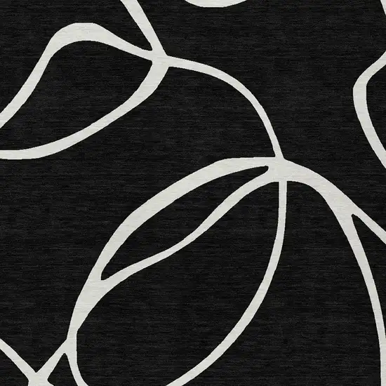 Black And Ivory Abstract Washable Indoor Outdoor Area Rug Photo 6