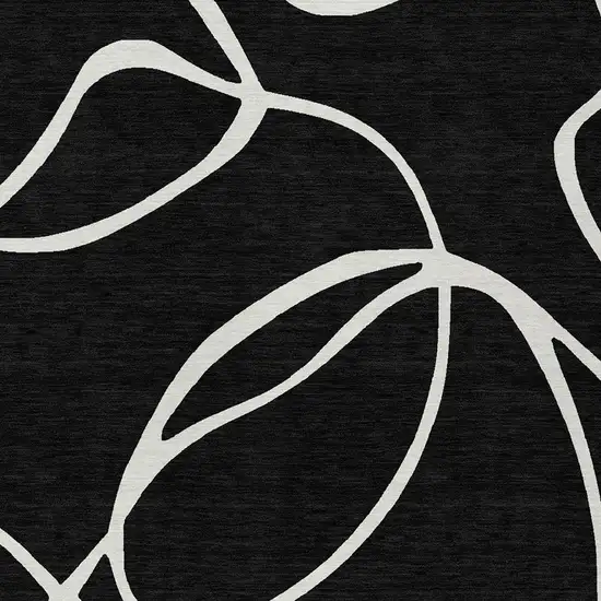 Black And Ivory Abstract Washable Indoor Outdoor Area Rug Photo 6