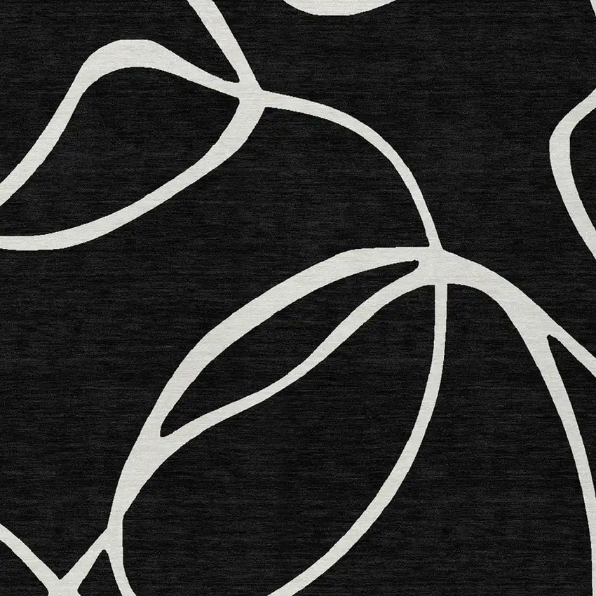 Black And Ivory Abstract Washable Indoor Outdoor Area Rug Photo 6