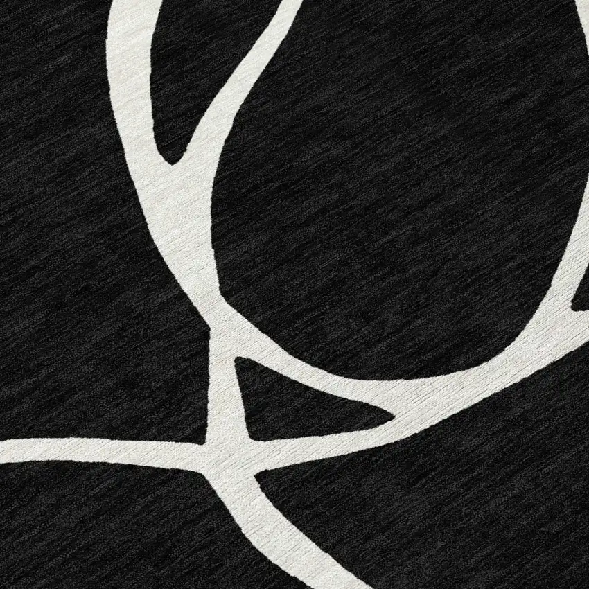 Black And Ivory Abstract Washable Indoor Outdoor Area Rug Photo 5