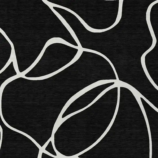 Black And Ivory Abstract Washable Indoor Outdoor Area Rug Photo 6