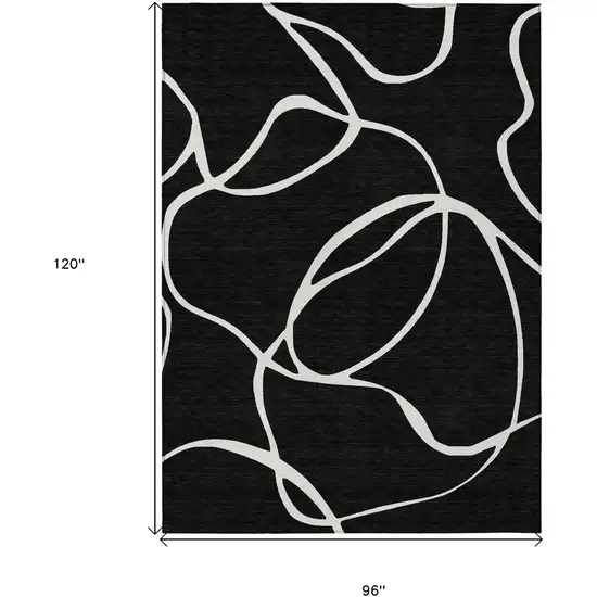 Black And Ivory Abstract Washable Indoor Outdoor Area Rug Photo 3