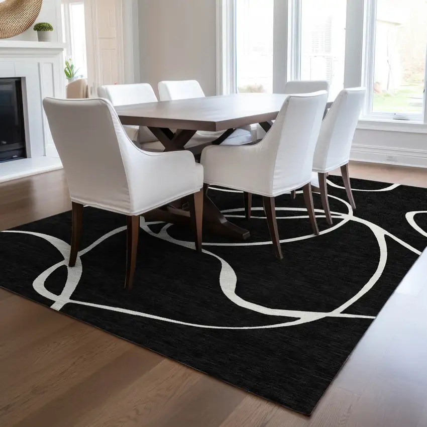 Black And Ivory Abstract Washable Indoor Outdoor Area Rug Photo 9