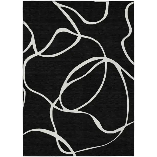 Black And Ivory Abstract Washable Indoor Outdoor Area Rug Photo 2