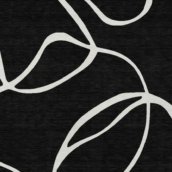 Black And Ivory Abstract Washable Indoor Outdoor Area Rug Photo 6