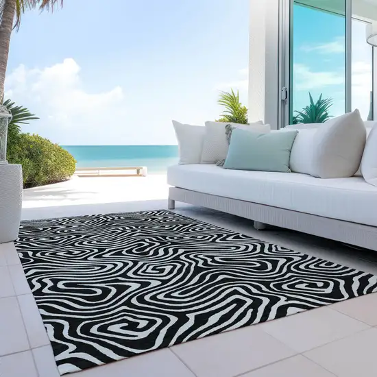 Black And Ivory Abstract Washable Indoor Outdoor Area Rug Photo 9