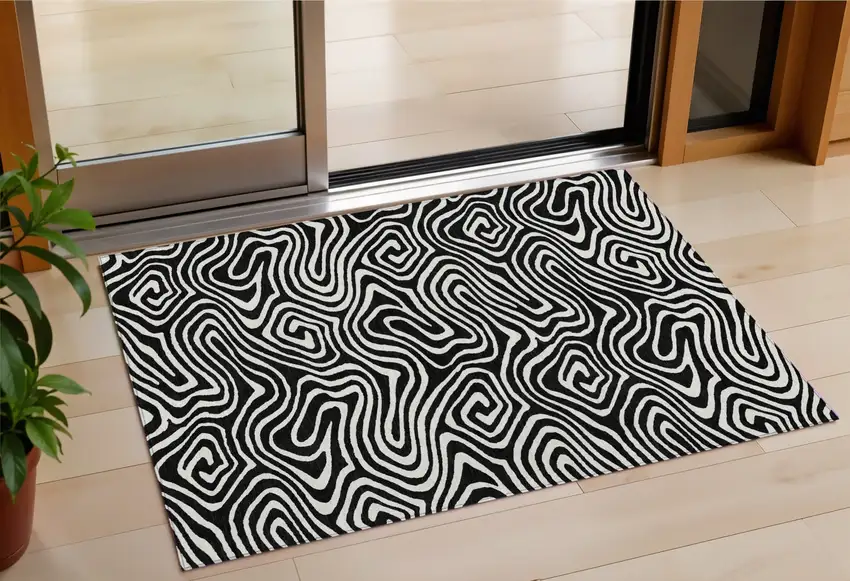 Black And Ivory Abstract Washable Indoor Outdoor Area Rug Photo 1