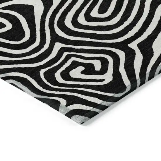 Black And Ivory Abstract Washable Indoor Outdoor Area Rug Photo 5